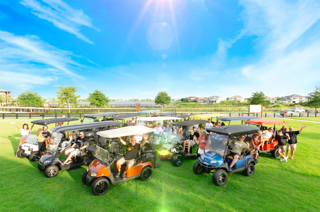 Local residents of Winter Garden, Florida prould pose with their trust golf carts.